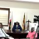 The Vice Chancellor, Prof. Barnabas Nawangwe (center) chats with the Makerere University Institute for Online Distance and e-Learning (IODeL) Multimedia team