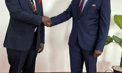 The Vice Chancellor, Prof. Barnabas Nawangwe (Left) shakes hands with Hon. John Mulimba