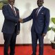 The Vice Chancellor, Prof. Barnabas Nawangwe (Left) shakes hands with Hon. John Mulimba