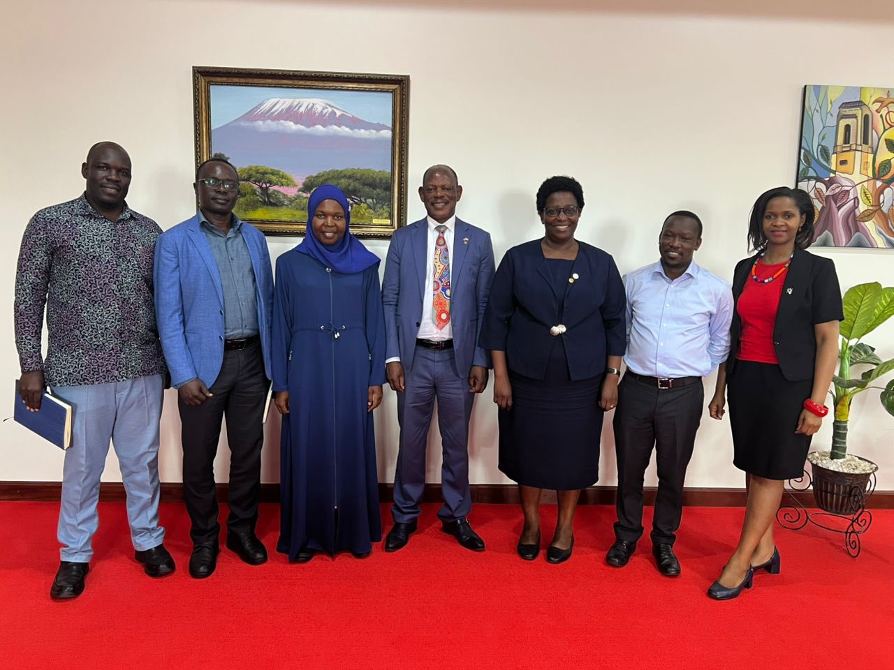 The Vice Chancellor, Prof. Barnabas Nawangwe (Center) poses with Principal Helen Nambalirwa Nkabala (3rd Right) Dr. Fred Kakooza (2nd Right) , Dr. Marion Alina (Right), Dr. Aisha Nakiwala (3rd Left), Mr. Kaija Wilson (2nd Left) and Dr. Imokola John Baptist (Left)