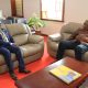 Vice Chancellor, Prof. Barnabas Nawangwe (L) and the former Kenyan President, Mr. Uhuru Kenyatta (R) having a discussion during their meeting at Makerere University.