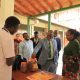 The Vice Chancellor, Prof. Barnabas Nawangwe (C) inspecting some of the sample work done at the Centre while at the lunch.
