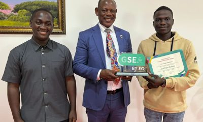 Prof. Barnabas Nawangwe (Center) with H.E. Vincent Lubega Nsamba (Left) and Ochom Felix (Right) pose as they show off the award
