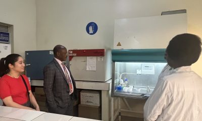 The Vice Chancellor inspecting machines in a laboratory at Makerere University Agricultural Research Institute Kabanyolo