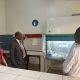 The Vice Chancellor inspecting machines in a laboratory at Makerere University Agricultural Research Institute Kabanyolo