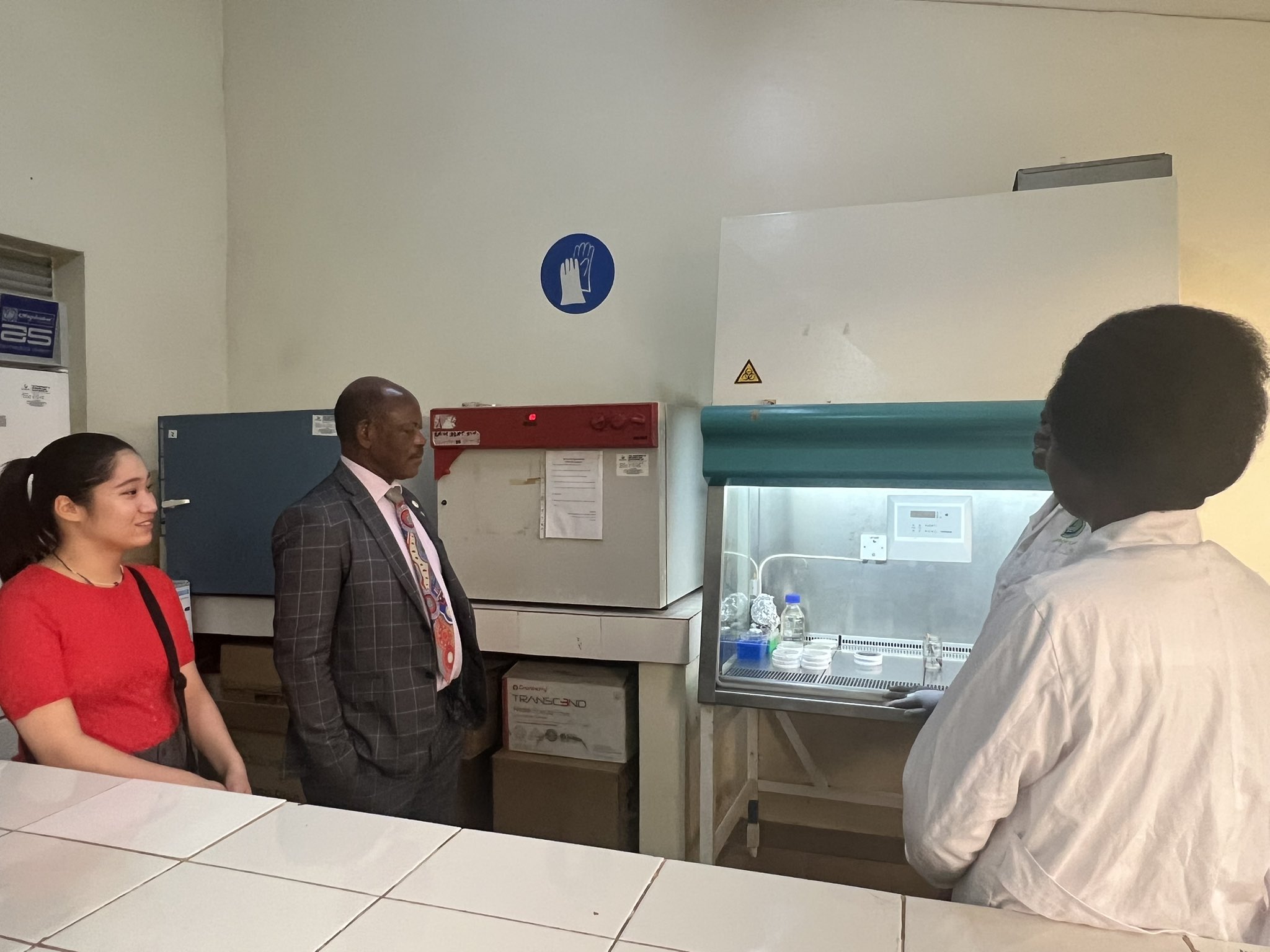 The Vice Chancellor inspecting machines in a laboratory at Makerere University Agricultural Research Institute Kabanyolo