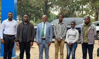 The Vice Chancellor, Prof. Barnabas Nawangwe (3RD L) together with the group of young people at the UnIPod.