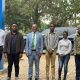 The Vice Chancellor, Prof. Barnabas Nawangwe (3RD L) together with the group of young people at the UnIPod.