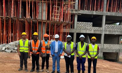 The Vice Chancellor, Prof. Barnabas Nawangwe (C) and the interning Makerere engineering students.