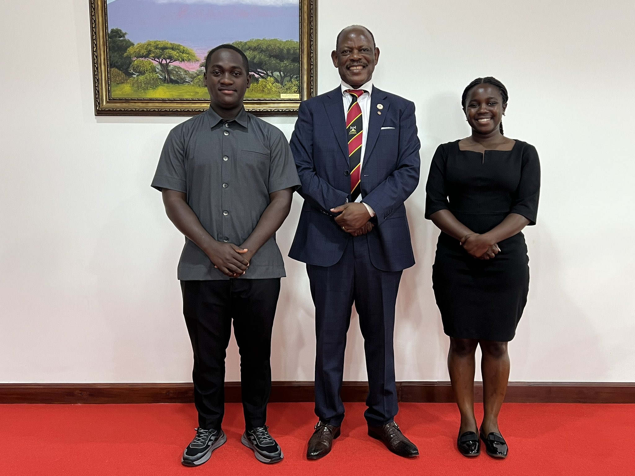 The Vice Chancellor, Prof. Barnabas Nawangwe (C) with former Guild President (L) and former Vice Guild President (R)