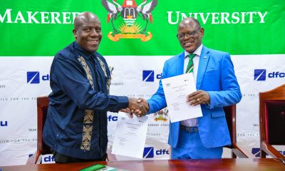 The Vice Chancellor-Prof. Barnabas Nawangwe (R) and MD DFCU Bank-Mr. Charles Mudiwa (L) shake hands after exchanging the signed MoU on 4th July 2025. Makerere University and DFCU Bank Limited sign a three-year Memorandum of Understanding (MoU) designed to enhance academic excellence, advance research and innovation capabilities, and provide crucial student support services through key activities; Annual Tumusiime Muteile Lecture, MakRun and Student activities, 4th July 2025, Council Room, Main Building, Makerere University, Kampala Uganda, East Africa.