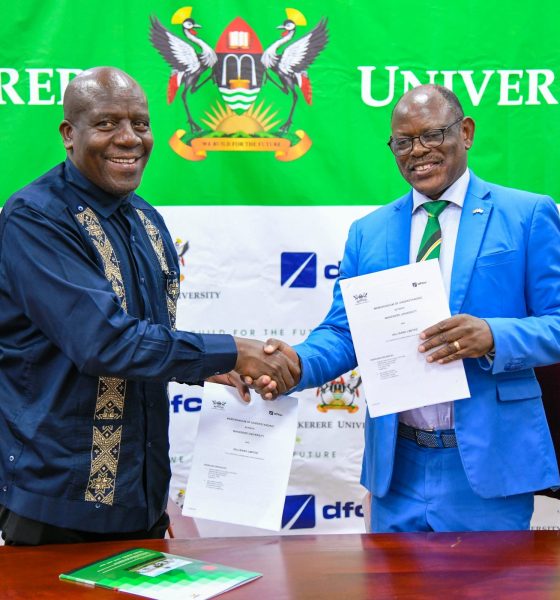 The Vice Chancellor-Prof. Barnabas Nawangwe (R) and MD DFCU Bank-Mr. Charles Mudiwa (L) shake hands after exchanging the signed MoU on 4th July 2025. Makerere University and DFCU Bank Limited sign a three-year Memorandum of Understanding (MoU) designed to enhance academic excellence, advance research and innovation capabilities, and provide crucial student support services through key activities; Annual Tumusiime Muteile Lecture, MakRun and Student activities, 4th July 2025, Council Room, Main Building, Makerere University, Kampala Uganda, East Africa.