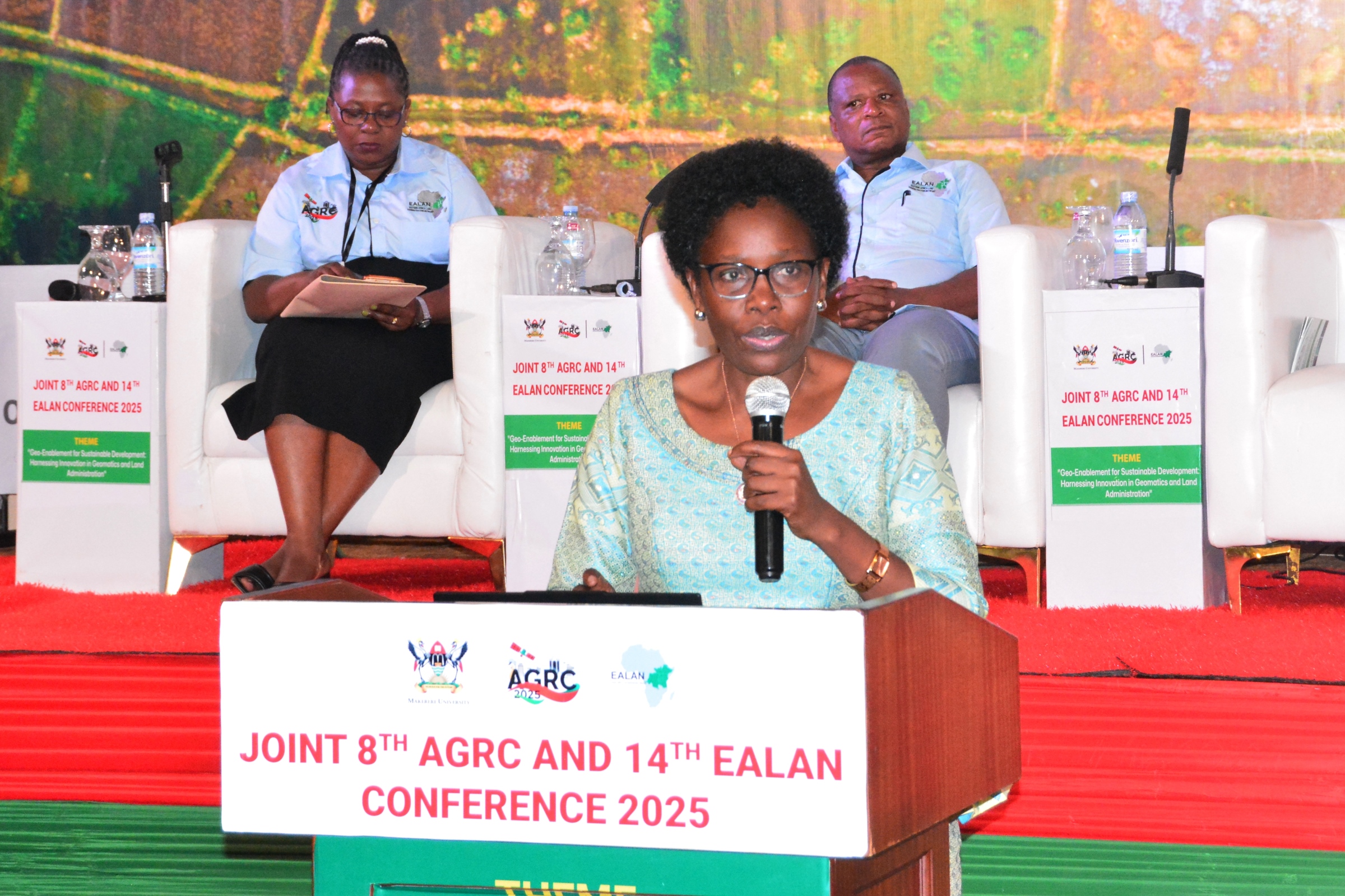 Minister of Lands, Housing, and Urban Development-Hon. Judith Nabakooba officially opens the Conference as Prof. Moses Musinguzi (Rear Right) and Dr. Lydia Mazzi Kayondo (Rear Left) witness. Makerere University, through College of Engineering, Design, Art and Technology (CEDAT), proudly hosted the first-ever Joint 8th Advances in Geomatics Research Conference (AGRC) and 14th Eastern Africa Land Administration Network (EALAN) Conference, 31st Jul-1st Aug 2025, Kabira Country Club, Kampala Uganda, East Africa.