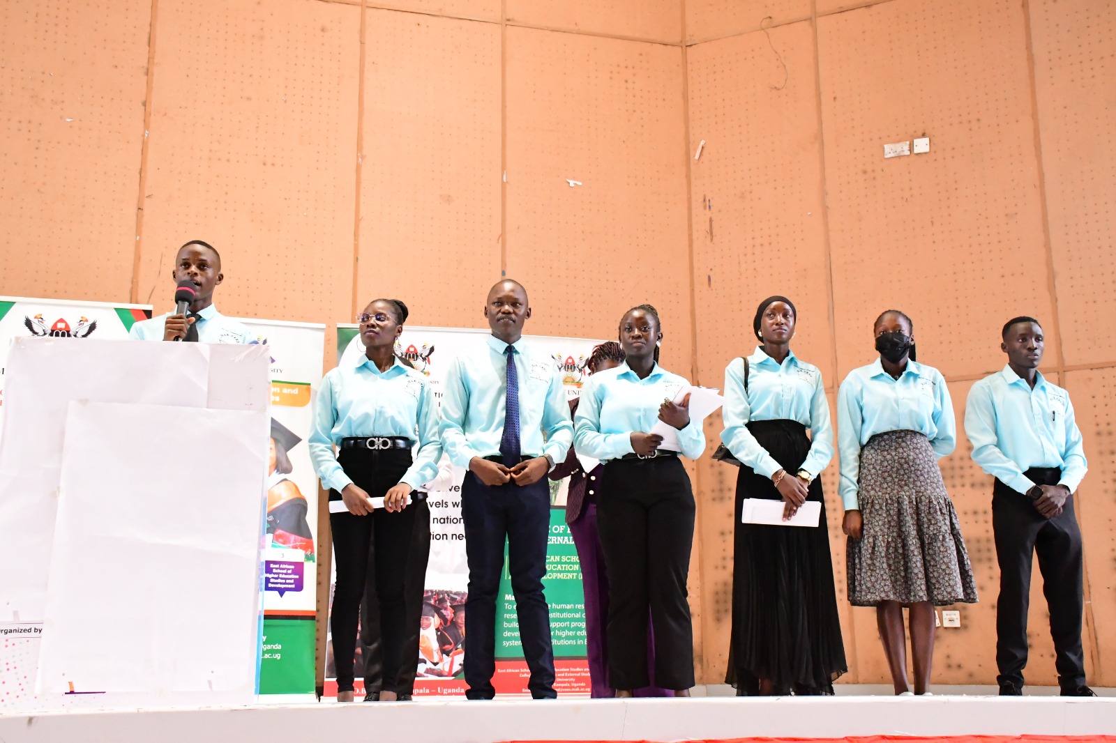 Hon. Samuel Asingya, Chairperson 91st College Guild Council and his team addressing freshers. College of Education and External Studies (CEES) orientation ceremony to acquaint new students with College structures, academic programmes, services, and, its contribution to the University’s core functions, 6th August 2025, Yusuf Lule Central Teaching Facility Auditorium, Makerere University, Kampala Uganda, East Africa.