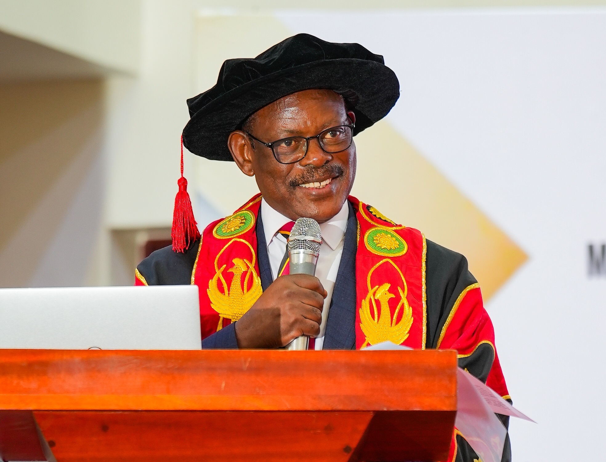 Prof. Barnabas Nawangwe addresses the congregation on 30th July 2025 in the Main Hall. Makerere University College of Health Sciences (MakCHS) in collaboration with Texas Children’s Global Hospital, Baylor College of Medicine Children’s Foundation–Uganda, the Ministry of Health (MOH) of Uganda, and Mulago National Referral Hospital (MNRH) Paediatric Haematology and Oncology Fellowship (PHO) Program 16 Fellows Award ceremony 30th July 2025, Kampala Uganda, East Africa.