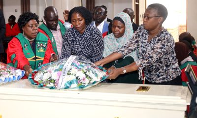 Left to Right: Prof. Gorretti Nassanga, Dr. John Baptist Imokola, Ms. Harriet Sebaana, Dr. Wilson Kaija, Dr. Aisha Nakiwala, Dr. Charlotte Ntulume and other colleagues lay a wreath on Dr. Brian Semujju's casket in St. Francis Chapel on 5th August 2025. Funeral service in honour of Dr. Brian Semujju-Senior Lecturer, Department of Journalism and Communication, School of Languages Literature and Communication, College of Humanities and Social Sciences (CHUSS), 5th August 2025, St. Francis Chapel, Makerere University, Kampala Uganda, East Africa.