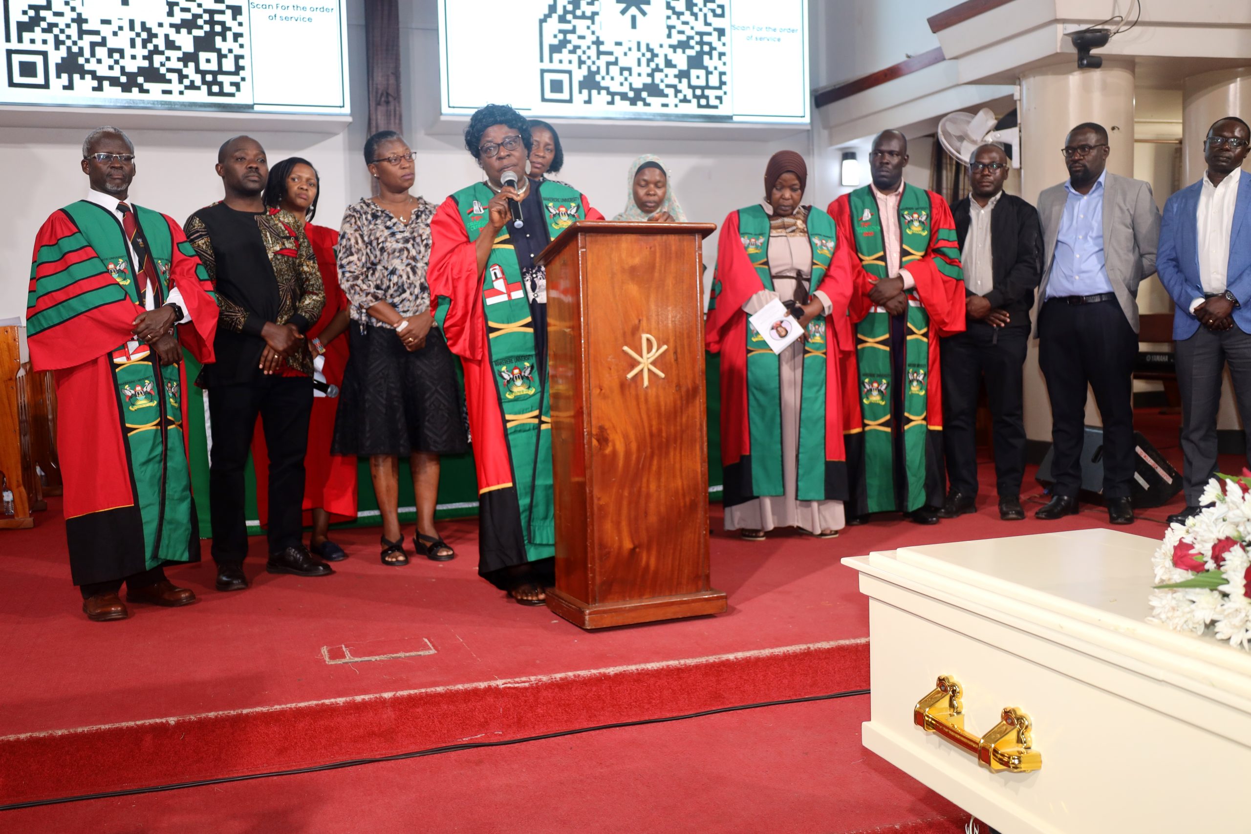 Prof. Gorretti Nassanga (Holding Microphone) is joined by members of the Department of Journalism and Communication to deliver their message. Funeral service in honour of Dr. Brian Semujju-Senior Lecturer, Department of Journalism and Communication, School of Languages Literature and Communication, College of Humanities and Social Sciences (CHUSS), 5th August 2025, St. Francis Chapel, Makerere University, Kampala Uganda, East Africa.