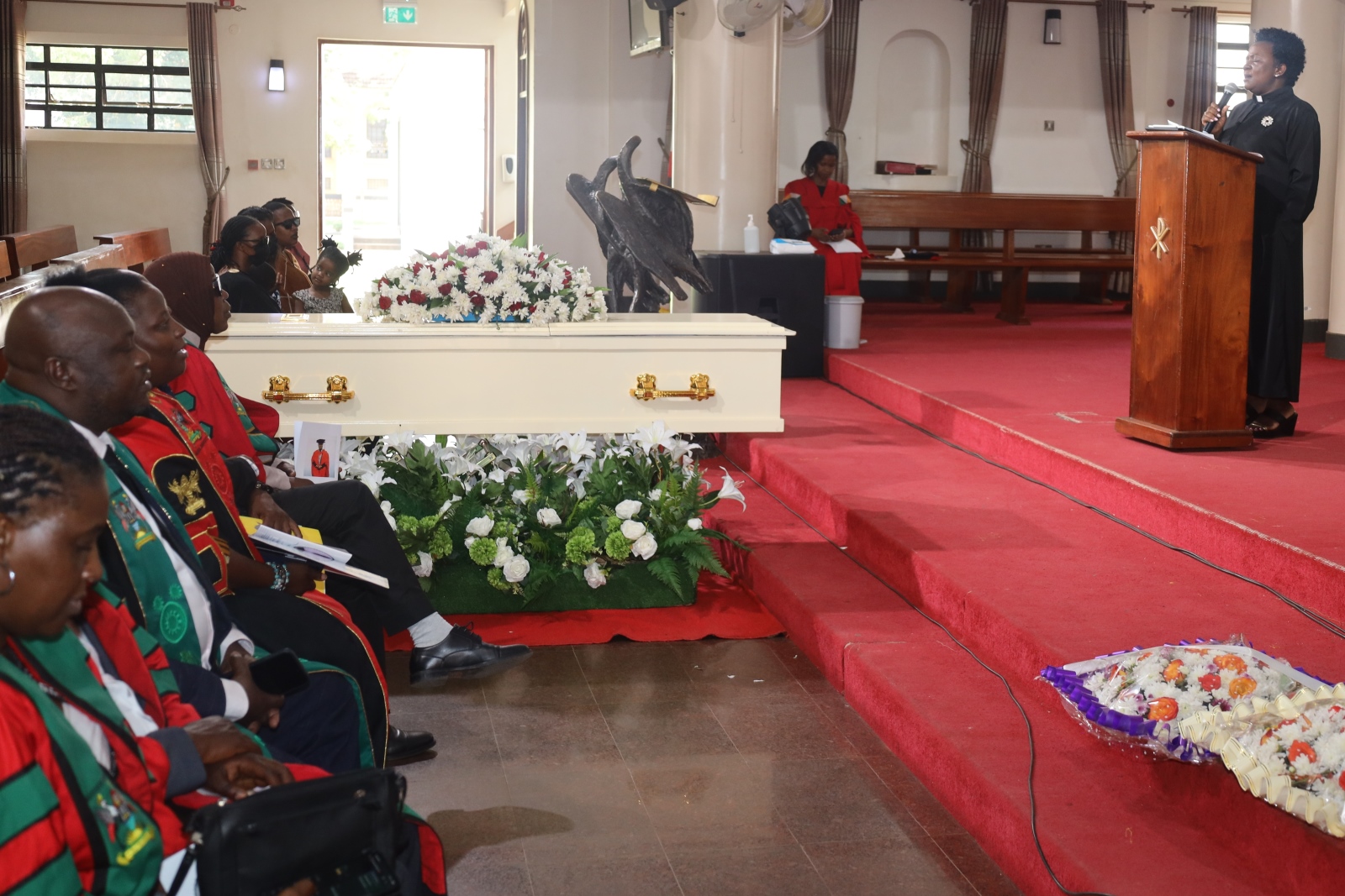 Rev. Canon Dr. Lydia Kitayimbwa leads congregants in song. Funeral service in honour of Dr. Brian Semujju-Senior Lecturer, Department of Journalism and Communication, School of Languages Literature and Communication, College of Humanities and Social Sciences (CHUSS), 5th August 2025, St. Francis Chapel, Makerere University, Kampala Uganda, East Africa.