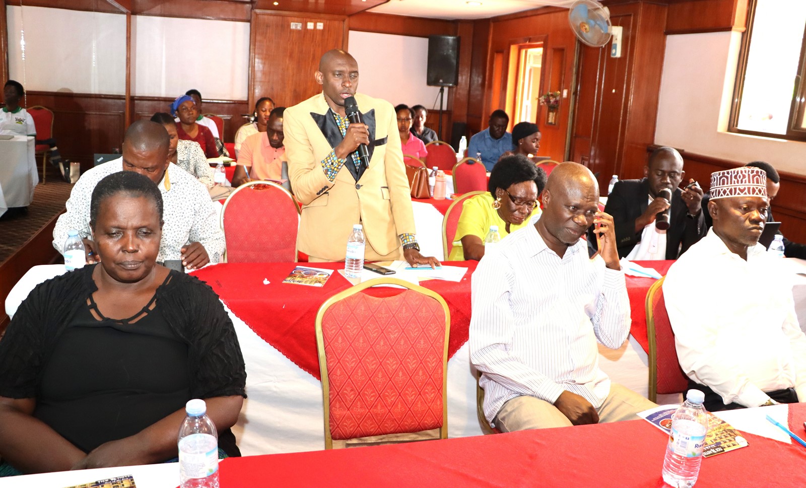 A stakeholder contributes during the discussions. Dissemination by EfD-Mak Centre at Makerere University of study “Differences in COVID-19 Effects on Food Security and Adaptive Strategies among the Urban Poor: Experiences from Uganda and Tanzania”, conducted between 2022 and 2023 in collaboration with EfD Tanzania, Tick Hotel Kawempe Division, Kampala Uganda, East Africa.