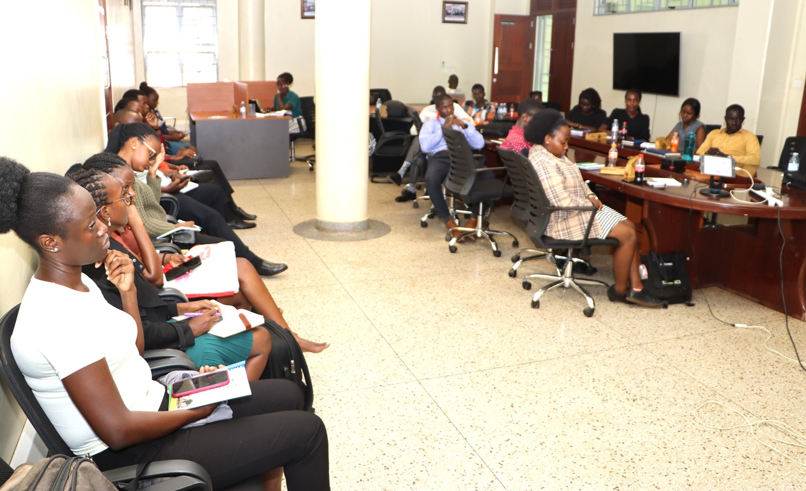 Participants attending the seminar in the EfD Conference room. Prof. Mark Purdon seminar and launch of his new book "The Political Economy of Climate Finance Effectiveness in Developing Countries: Carbon Markets, Climate Funds, and the State" hosted by the Environment for Development (EfD) Makerere Centre, 27th August 2025, Yusuf Lule Central Teaching Facility, Makerere University, Kampala Uganda, East Africa.