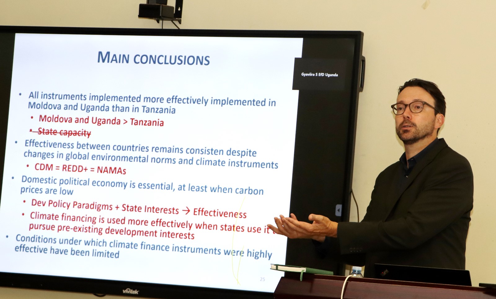 Prof. Purdon concluding his presentation. Prof. Mark Purdon seminar and launch of his new book "The Political Economy of Climate Finance Effectiveness in Developing Countries: Carbon Markets, Climate Funds, and the State" hosted by the Environment for Development (EfD) Makerere Centre, 27th August 2025, Yusuf Lule Central Teaching Facility, Makerere University, Kampala Uganda, East Africa.
