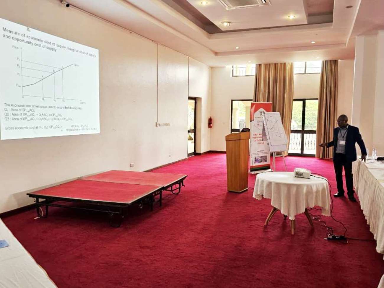 Dr. Kagarura conducts one of the training sessions. Public Investment Management Centre of Excellence (PIM CoE), Makerere University, Kampala, Ministry of Finance, Planning and Economic Development (MoFPED) and Cambridge Resources International (CRI), two-week intensive training on Economic Appraisal and Stakeholder Analysis for public officers from MDAs in Fort Portal, August 18 to 29, 2025, Final Module of the Investment Appraisal and Risk Analysis (PIAR) II Course.