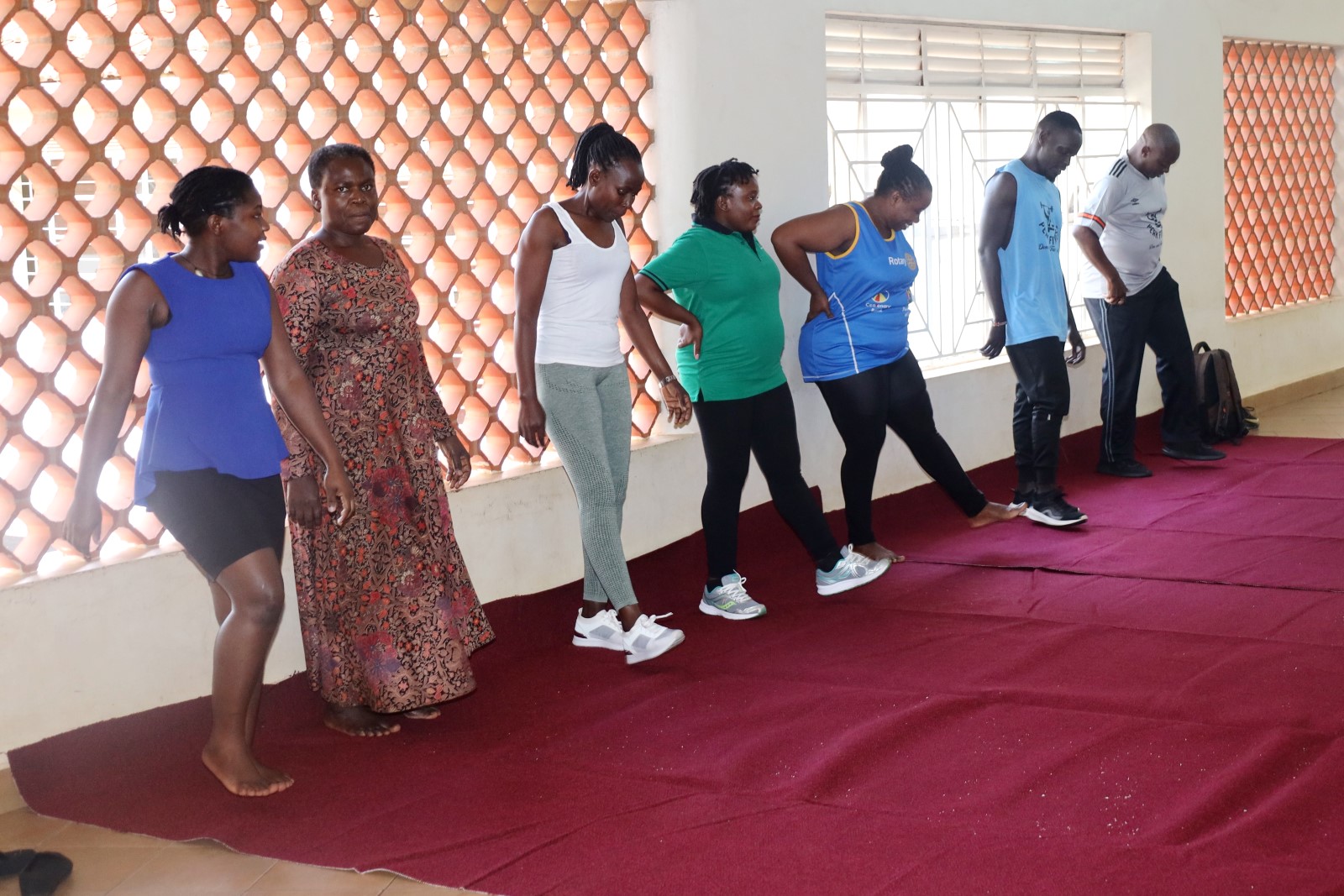 Assoc. Professor James Wokadala-Deputy Principal CoBAMS (Right) Ms. Claire Nakaseeta-Assistant Librarian (3rd Left), Ms. Sarah Wegosasa-Administrative Secretary (3rd Right) and other staff during the session. Deputy Principal, Associate Professor James Wokadala launches College of Business and Management Sciences (CoBAMS) physical fitness program to promote wellness, better health, team work and cohesion, 17th July 2025, Makerere University, Kampala Uganda, East Africa.