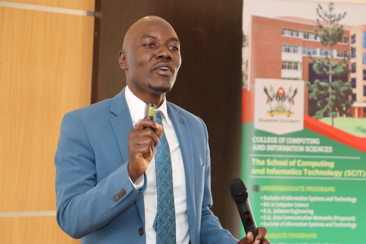 Emmanuel Kitamirike speaking. College of Computing and Information Sciences (CoCIS), Makerere University, Kampala Uganda, East Africa permanent endowment fund launched by Vice Chancellor-Prof. Barnabas Nawangwe to: enhance student opportunities through scholarships and bursaries, accelerate groundbreaking research endeavors, and catalyze innovation, 15th August 2025, Source of the Nile Hotel during College Retreat 14th-16th August 2025, Jinja City.
