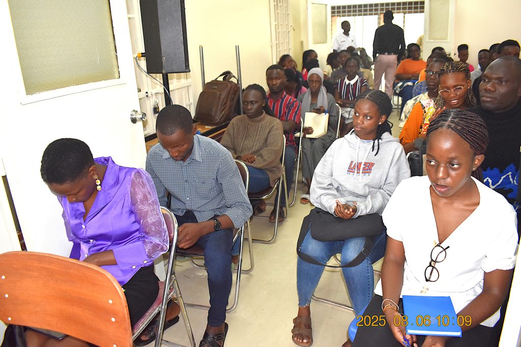 Some of the students listening to officials. College of Natural Sciences (CoNAS) orientation ceremony to acquaint new students with College structures, academic programmes, services, and, its contribution to the University’s core functions, 6th August 2025, JICA Building, Makerere University, Kampala Uganda, East Africa.