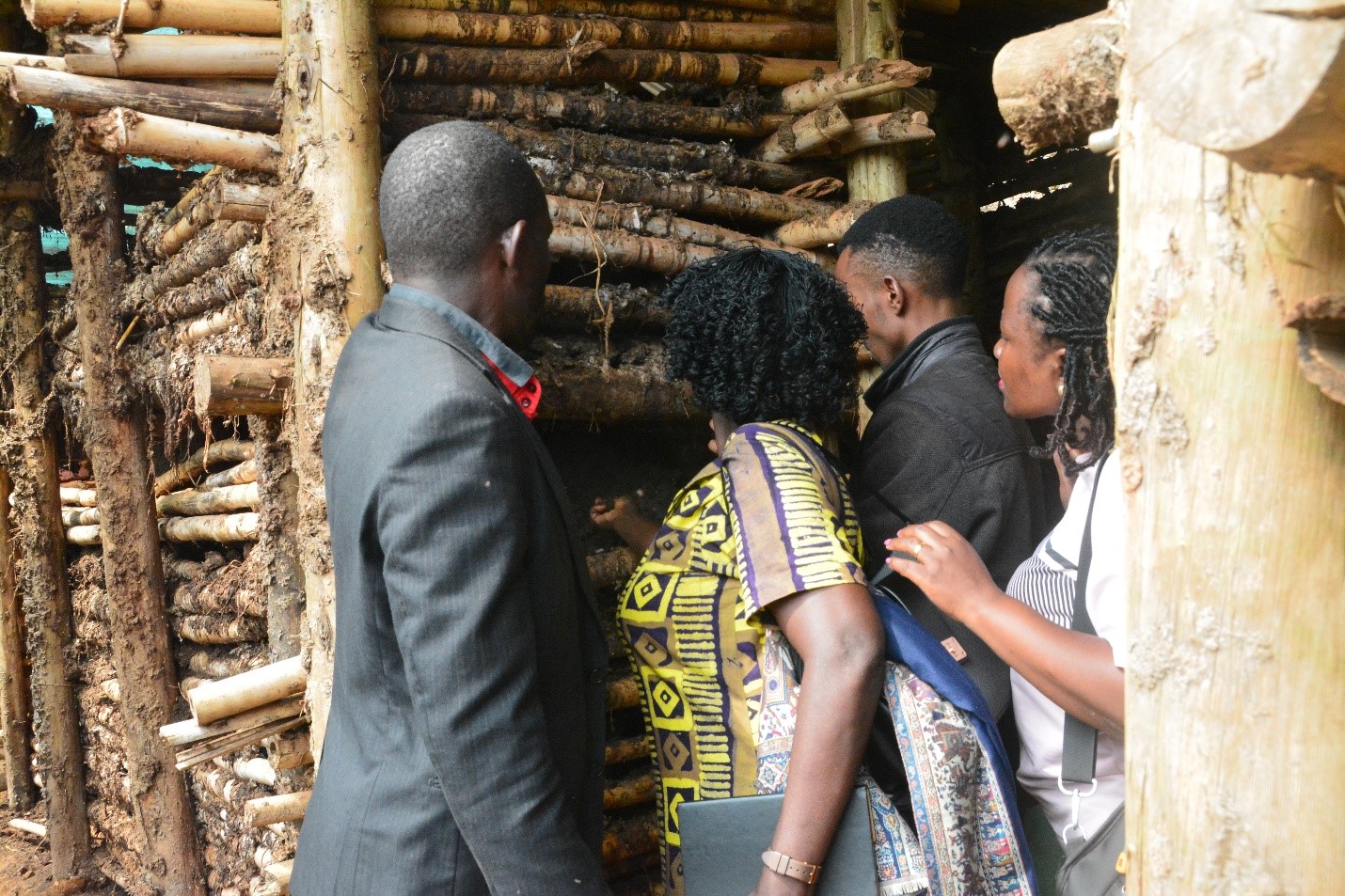 The Scientists inspect the innovation where wastes are dumped and will eventually turn into manure. Regional research initiative “Building Capacity for Innovation and Advancement of Climate Smart Agriculture in East and Southern Africa” (CICSA-E&SA) visited to Mr. Mugisha Jonan, urban farmer and environmentalist in Sentema Wakiso District, adoption of innovative practices redefining the feasibility of farming in densely populated urban settings through the Nutrient Recycling Innovation, CoVAB, Makerere University, Kampala Uganda.