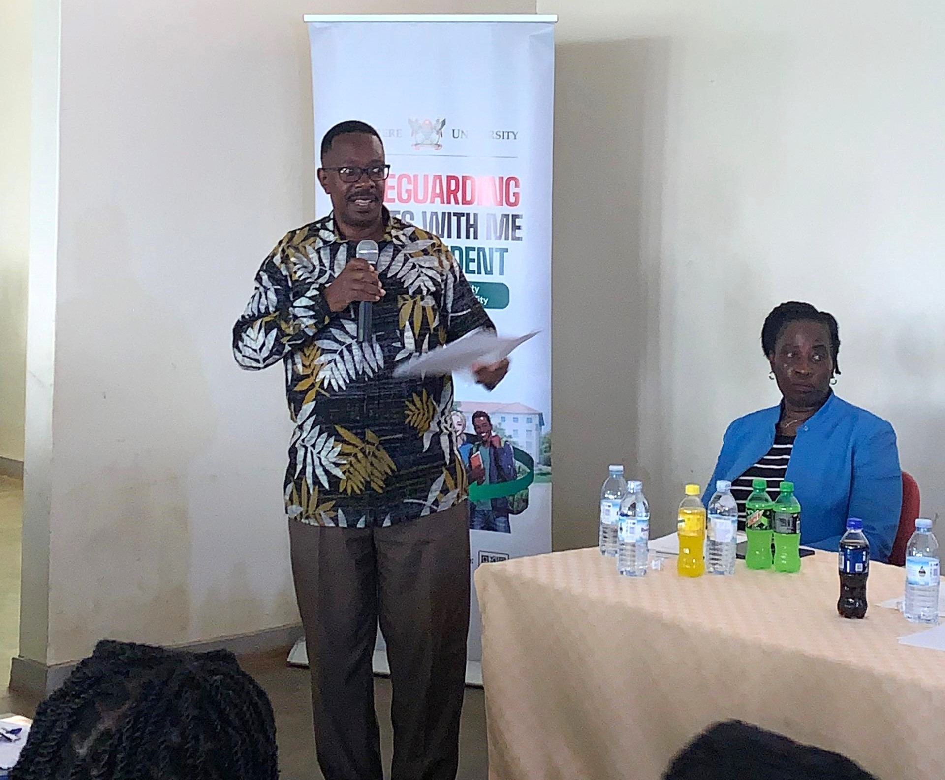 The College Registrar, Mr. Byarugaba Richard, flanked by Ms. Rose Nalwanga from the Guidance and Counselling Centre, Makerere University. Orientation to welcome incoming undergraduate students at College of Veterinary Medicine, Animal Resources and Biosecurity (CoVAB), Thursday 7th August 2025, Media Room, CoVAB, Makerere University, Kampala Uganda, East Africa.