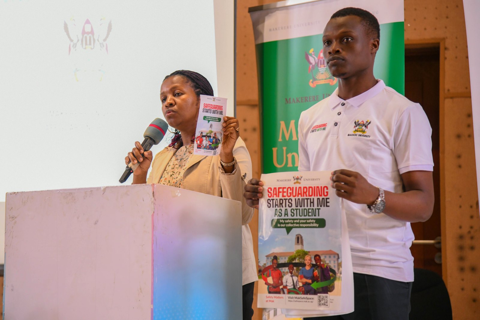Ms. Diana Nabikolo (Left) with one of the College Safeguarding Champions. Orientation for Postgraduate students held at the Yusuf Lule Central Teaching Facility Auditorium on 11th August 2025, Makerere University, Kampala Uganda, East Africa.