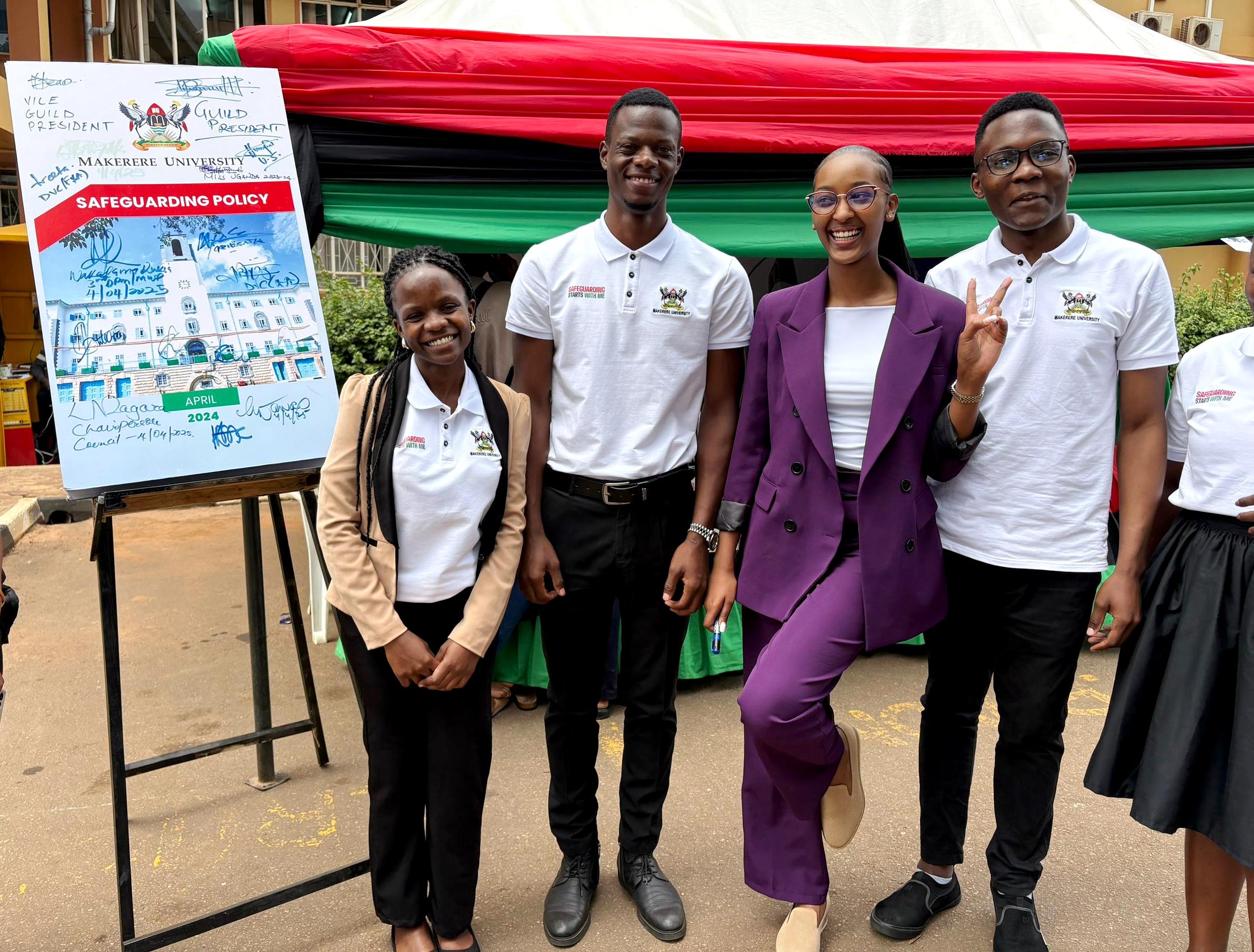 Hannah Karema (2nd Right) with Student Safeguarding Champions outside their tent at Senate Building. Makerere University officially kicks off 2025/2026 academic year with a Freshers’ Orientation at the Freedom Square on Monday 4th August 2025, Kampala Uganda, East Africa.