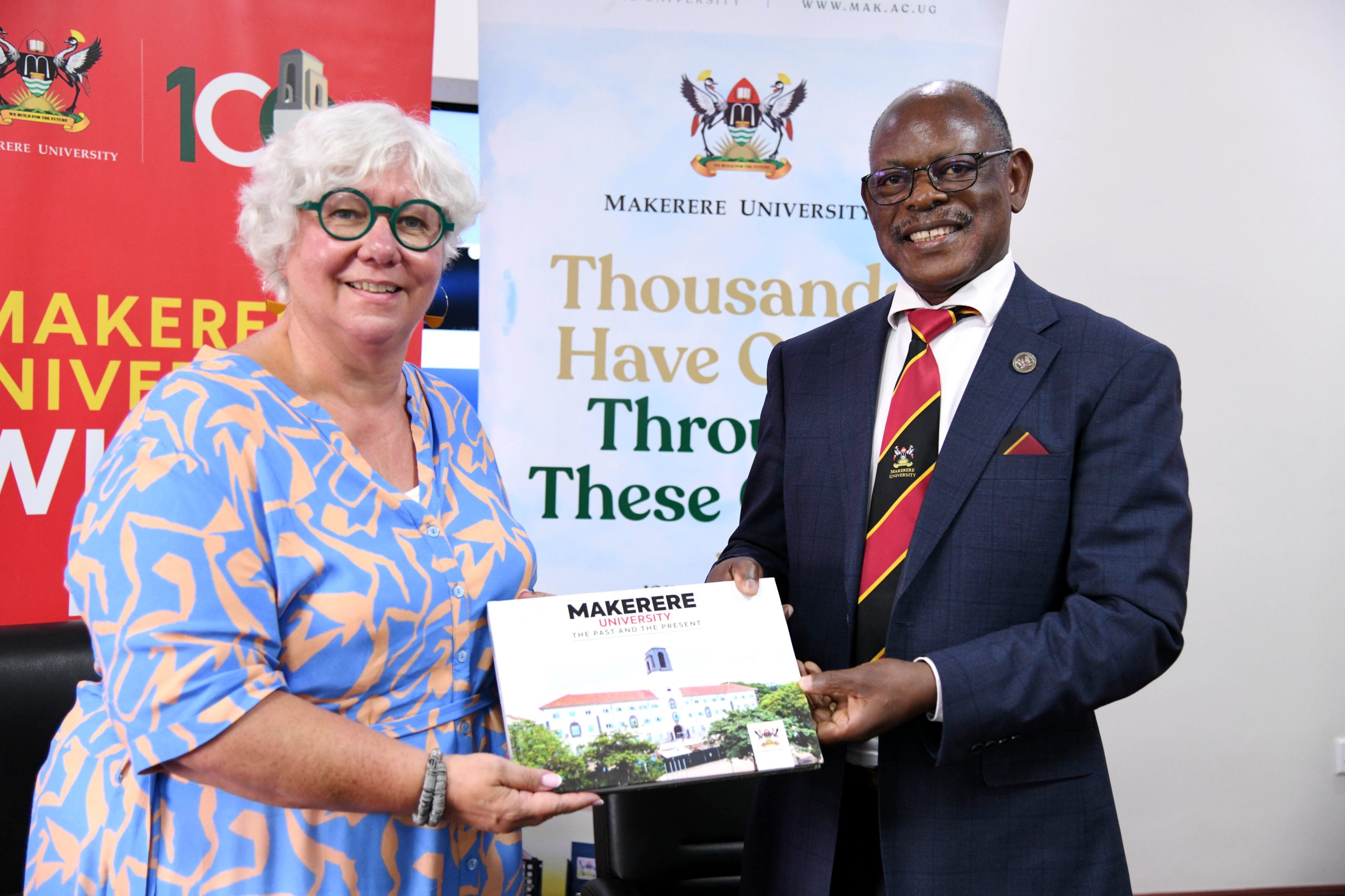 Prof. Barnabas Nawangwe (Right) presents a Makerere Coffee Table book to Prof. Mieke Van Herreweghe during the visit on 27th August 2025. Makerere University hosted a delegation from the Ghent University Association where a student exchange agreement was signed, led by Prof. Mieke Van Herreweghe, Vice Rector of Ghent University. The delegation included representatives from Howest University and Hogent University of Applied Sciences, 27th August 2025 Kampala Uganda, East Africa.