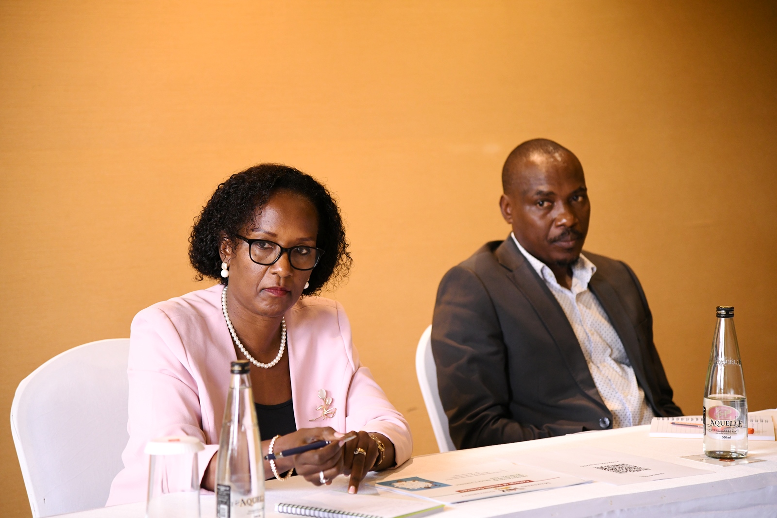 Mrs. Lorna Magara (Left) flanked by Prof. Winston Tumps Ireeta pays keen attention to submissions by College Principals. Top Management Capacity Building Training for Makerere University aimed at building excellence in 21st Century University Leadership at Makerere through two objectives namely; Strategic Budget Mastery and Implementation Excellence, and Comprehensive Management Excellence and Skills Enhancement on 14th August 2025, Speke Resort Munyonyo, Kampala Uganda, East Africa.