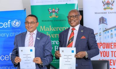 The Vice Chancellor Professor Barnabas Nawangwe (Right) and UNICEF Uganda Representative Dr. Robin Nandy (Left) show off the signed MoU on 14th August 2025. Makerere University (Mak) and United Nations Children’s Fund (UNICEF) Uganda sign MoU that launches a two-year, renewable partnership aimed at advancing child rights and well-being through rigorous research, capacity building, and policy-driven innovation, CFC, MITER, CEES, MakSPH, 14th August 2025, Main Building, Kampala Uganda, East Africa.