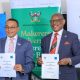 The Vice Chancellor Professor Barnabas Nawangwe (Right) and UNICEF Uganda Representative Dr. Robin Nandy (Left) show off the signed MoU on 14th August 2025. Makerere University (Mak) and United Nations Children’s Fund (UNICEF) Uganda sign MoU that launches a two-year, renewable partnership aimed at advancing child rights and well-being through rigorous research, capacity building, and policy-driven innovation, CFC, MITER, CEES, MakSPH, 14th August 2025, Main Building, Kampala Uganda, East Africa.