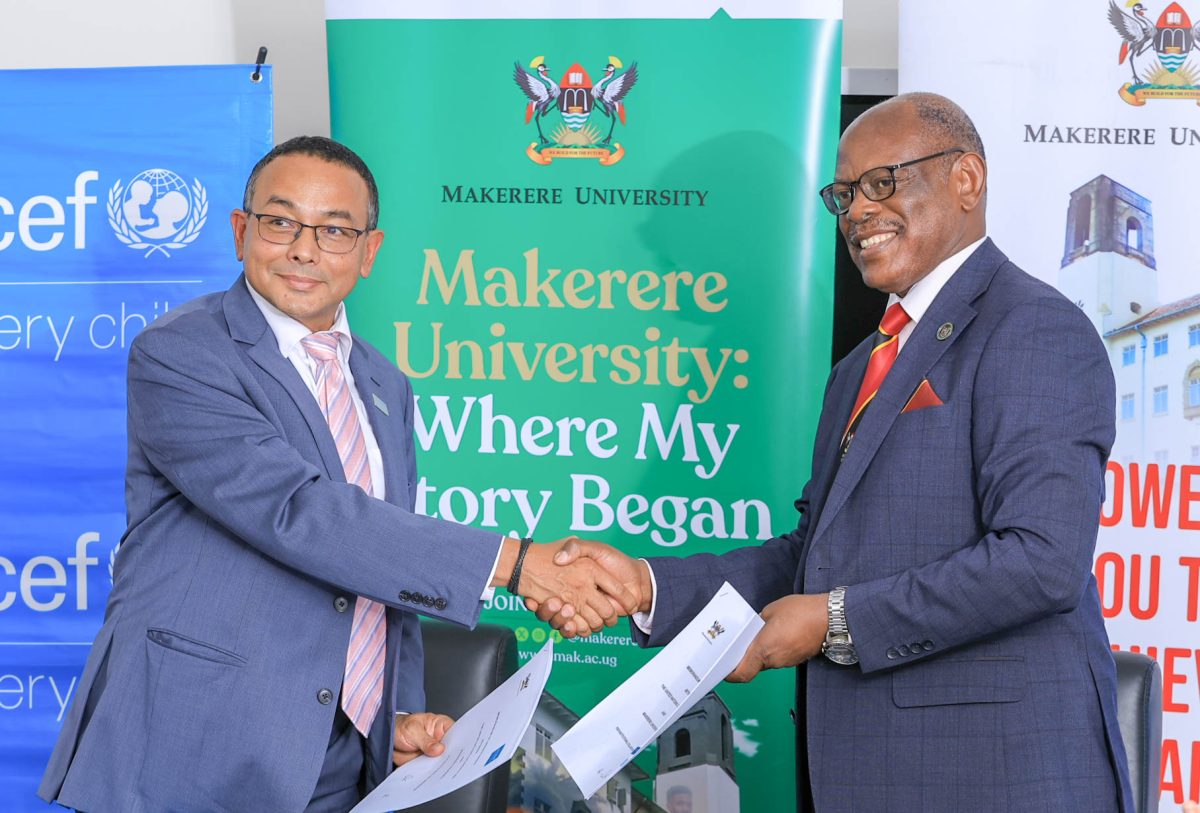Professor Barnabas Nawangwe (Right) and Dr. Robin Nandy (Left) shake hands after signing the MoU. Makerere University (Mak) and United Nations Children’s Fund (UNICEF) Uganda sign MoU that launches a two-year, renewable partnership aimed at advancing child rights and well-being through rigorous research, capacity building, and policy-driven innovation, CFC, MITER, CEES, MakSPH, 14th August 2025, Main Building, Kampala Uganda, East Africa.