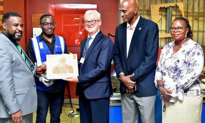 Prof. Robert Wamala (Left) hands over the souvenir produced in the Mak UniPod to Mr. Michel Dewez (Centre) as Mr. Ian King (2nd Right), Dr. Margaret Nagwovuma (Right) and an official (2nd Left) witness on 1st September 2025. Delegation from the Belgian Embassy in Uganda, accompanied by representatives from ENABEL and the United Nations Development Programme (UNDP) visit to the Makerere University Innovation Pod (Mak UniPod), 1st September 2025, Kampala, East Africa.