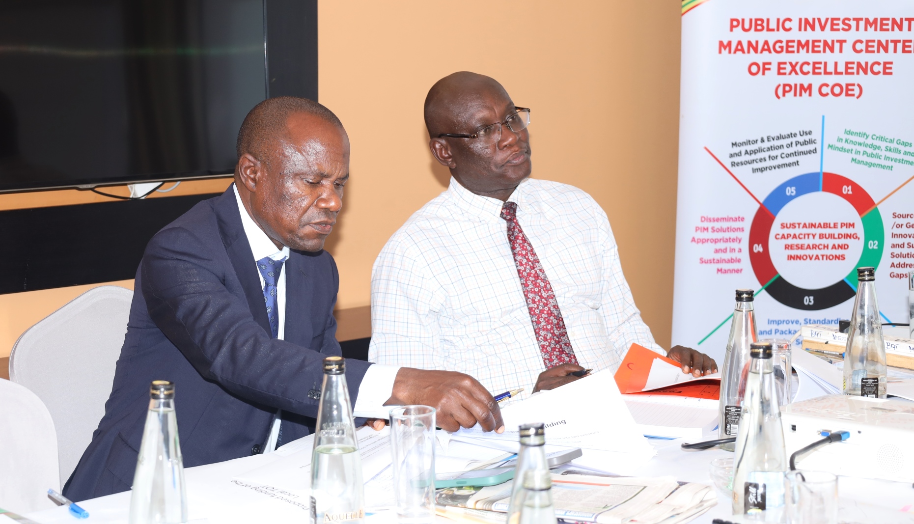 Prof. Eria Hisali (Left) and Mr. Hannington Ashaba (Right). Public Investment Management Centre of Excellence (PIM CoE) Makerere University Steering Committee meeting, 4th September 2025 at Mestil Hotel, Kampala Uganda, East Africa.