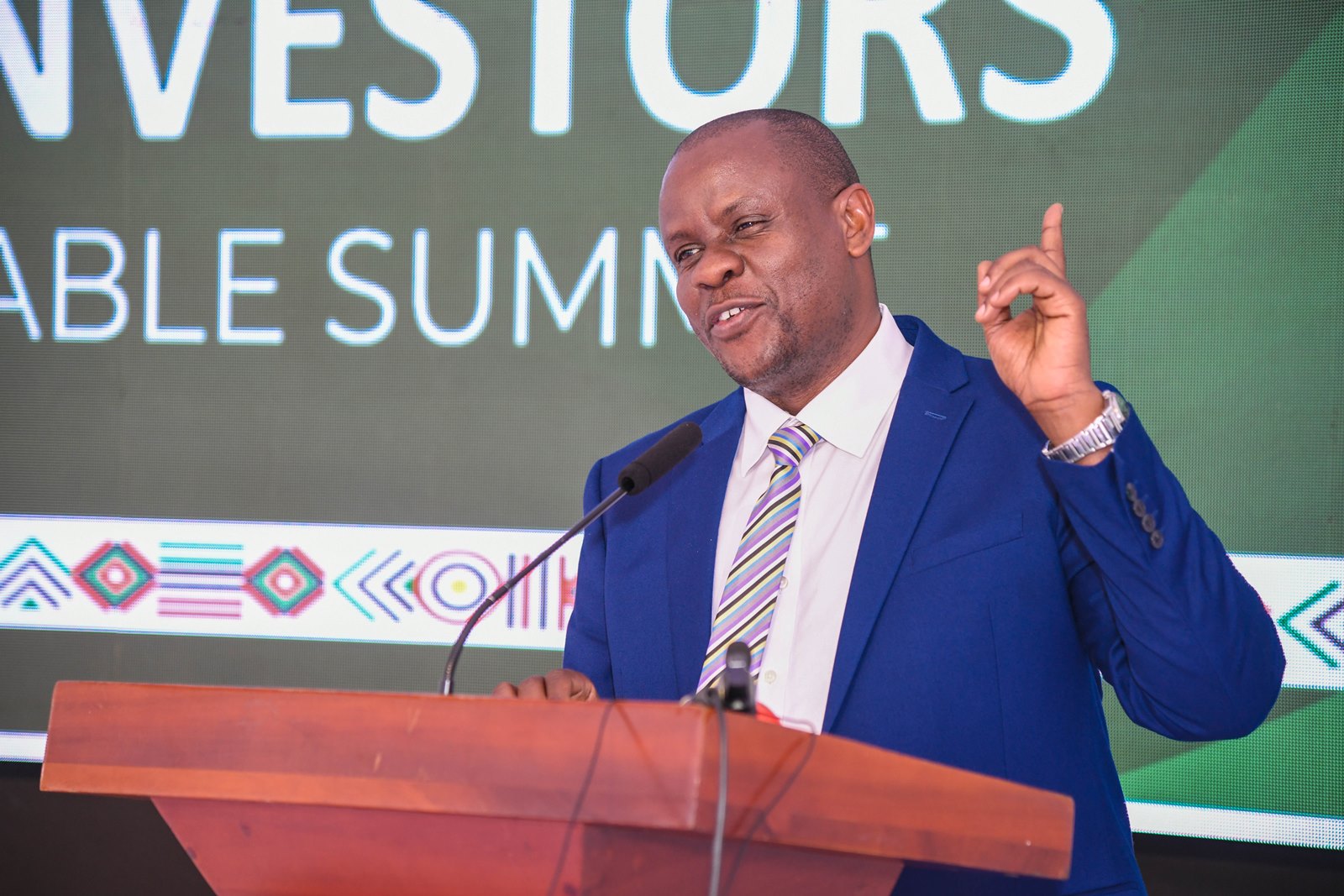 Hon. Balaam Barugahara gestures. Makerere University Convocation (MUC) first-ever CEOs/Investors’ Round Table Summit, 2nd September 2025, Convocation House, Edge Road, Kampala Uganda, East Africa.