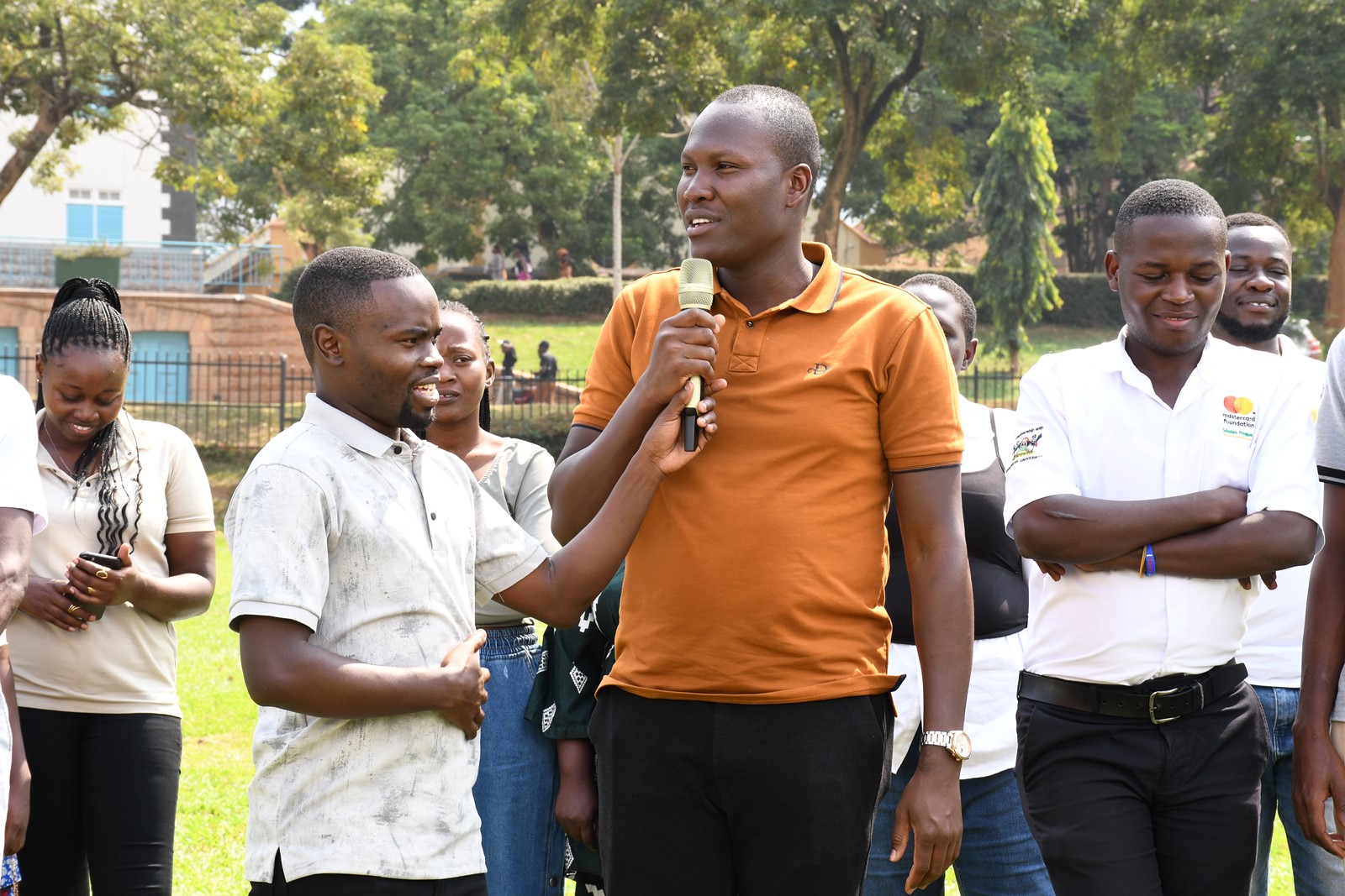 A cross-section of the alumni making their pledges towards the scholars give back project. Mastercard Foundation Scholars Community Open Day, September 6, 2025, Freedom Square, Makerere University, Kampala Uganda, East Africa.