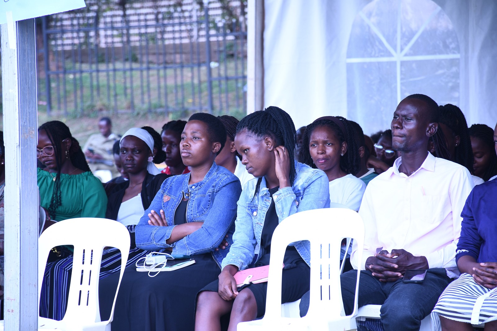 A cross-section of scholar-alumni, listening attentively during the event. Mastercard Foundation Scholars Community Open Day, September 6, 2025, Freedom Square, Makerere University, Kampala Uganda, East Africa.