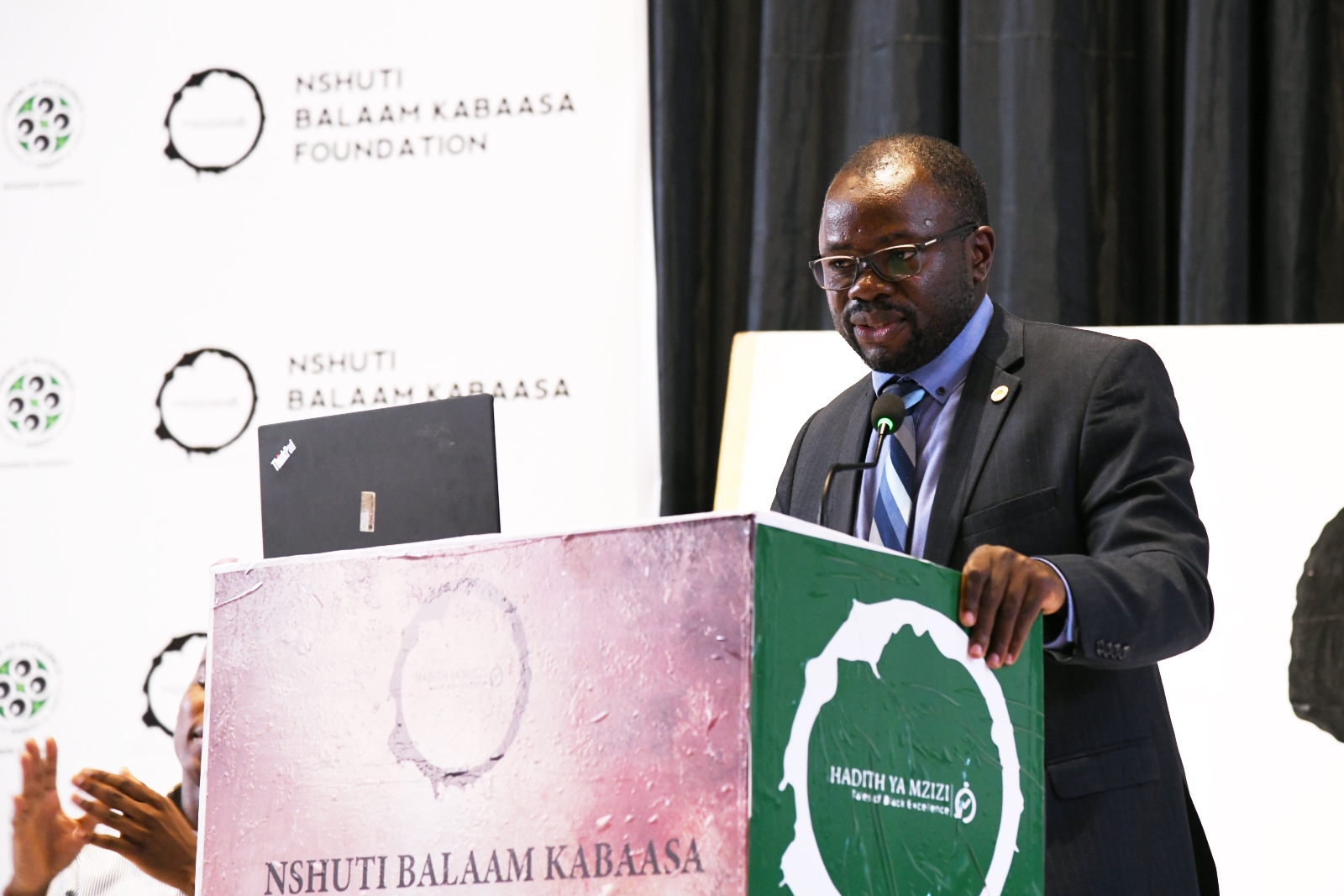 Prof. Ibrahim Mike Okumu delivers the keynote address. 3rd edition of Hadithi Ya Mzizi to celebrate the resilience and innovation of the informal sector through art exhibition and to memorialize its founder, the late Nshuti Balaam Kabaasa, 29th August 2025 Makerere University, Kampala Uganda, East Africa.