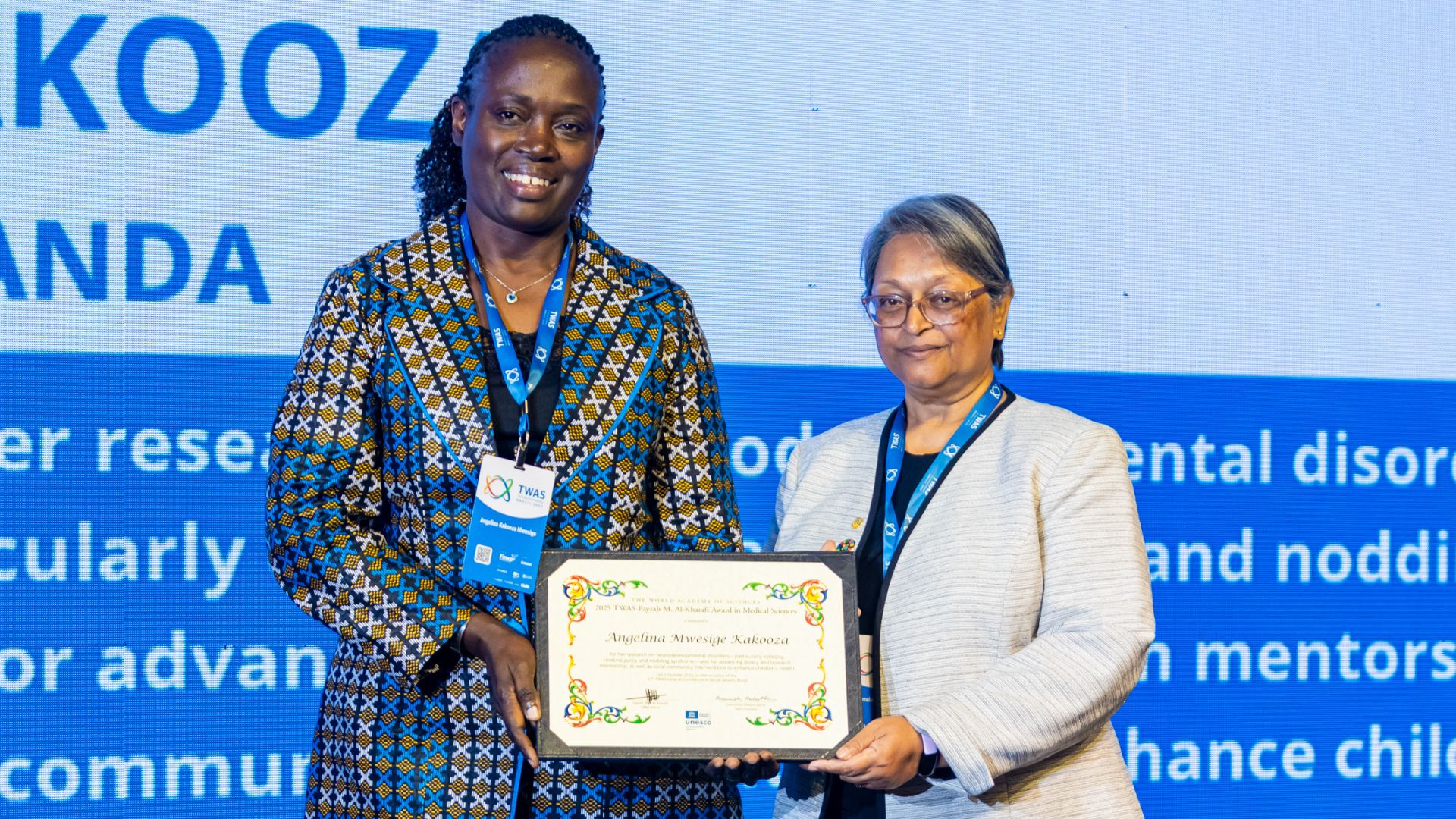 Dr. Angelina Mwesige Kakooza, Associate Professor of Paediatrics in the Department of Paediatrics and Child Health receives her award.