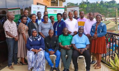 Participants in a group photo after the opening session