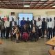 Participants of the co-creation workshop pause for a group photo