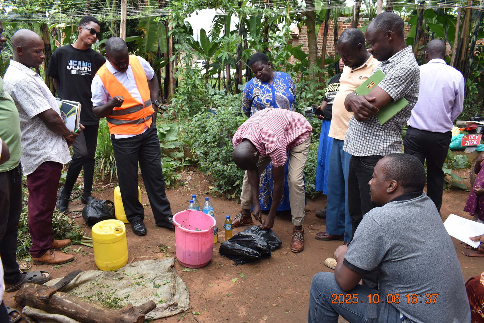 Mr. Mbowa training the farmers on the use of human urine in the production of fertilizers. Phase II of the Resilient Urban Food Systems (RUFS) Project, Department of Geography, Geo-Informatics, and Climatic Sciences at Makerere University, Kampala Uganda, East Africa and funded through the AgriFoSe2030 Programme, practical techniques for producing organic fertilizers and pesticides using affordable, locally available materials 6th to 7th October 2025, Emily Royal Mixed Farm, Industrial City Division, Mbale City.