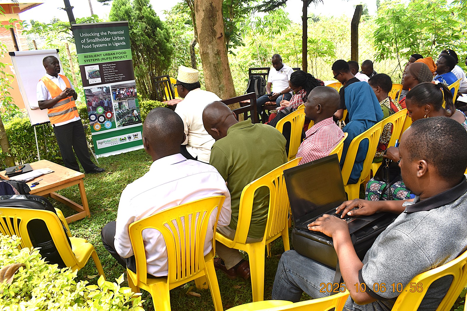 Mr. Henry Stanley Mbowa, project member briefing the team about the planned training on the production of organic fertilizers and pesticides. Phase II of the Resilient Urban Food Systems (RUFS) Project, Department of Geography, Geo-Informatics, and Climatic Sciences at Makerere University, Kampala Uganda, East Africa and funded through the AgriFoSe2030 Programme, practical techniques for producing organic fertilizers and pesticides using affordable, locally available materials 6th to 7th October 2025, Emily Royal Mixed Farm, Industrial City Division, Mbale City.