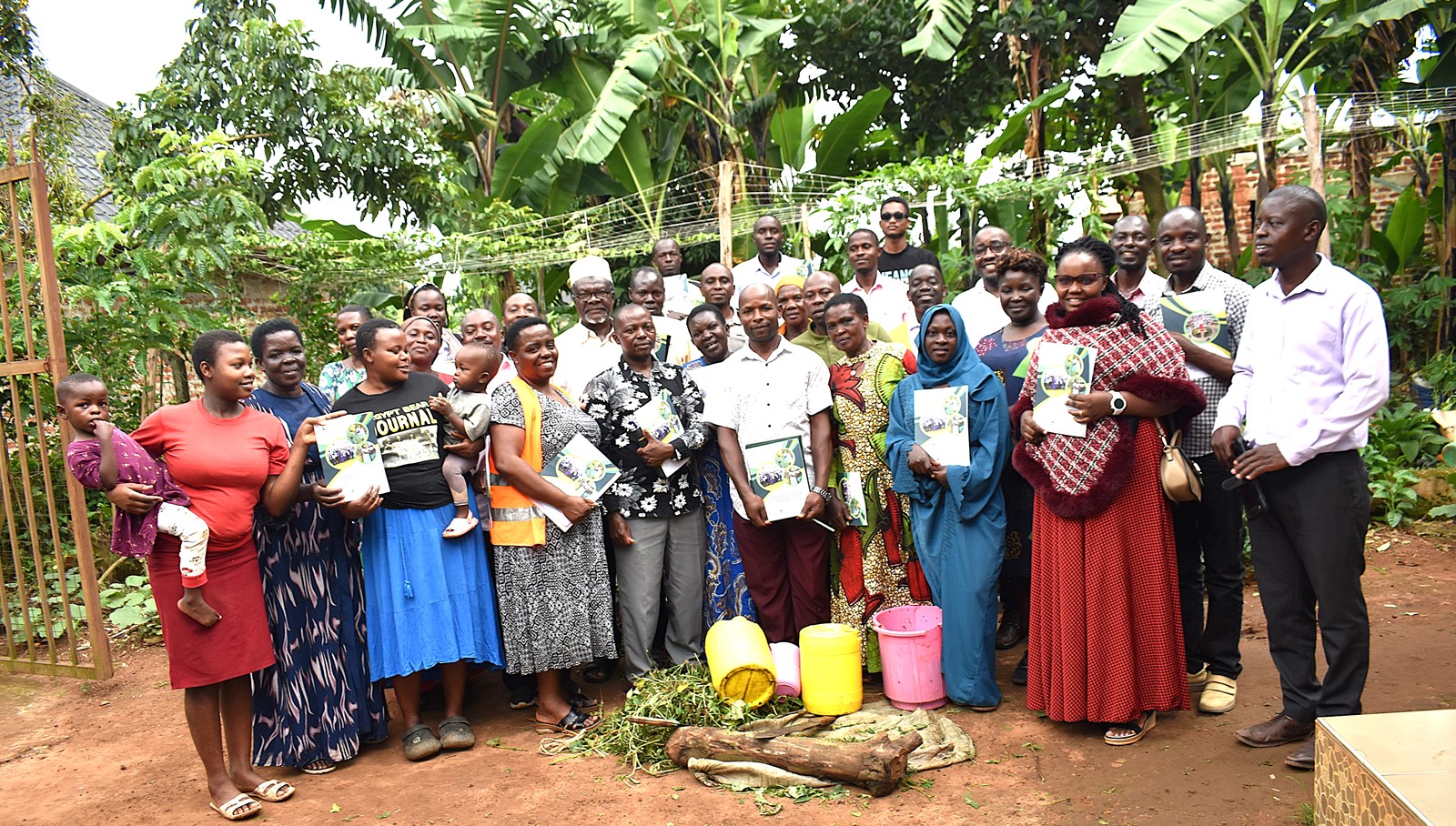 The Project team led by Prof. Frank Mugagga together with the farmers at Emily Royal Mixed Farm, the training site. Phase II of the Resilient Urban Food Systems (RUFS) Project, Department of Geography, Geo-Informatics, and Climatic Sciences at Makerere University, Kampala Uganda, East Africa and funded through the AgriFoSe2030 Programme, practical techniques for producing organic fertilizers and pesticides using affordable, locally available materials 6th to 7th October 2025, Emily Royal Mixed Farm, Industrial City Division, Mbale City.